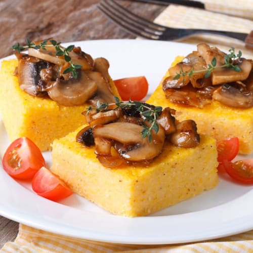 Polenta with sautéed mushrooms and fresh tomatoes at Al Dos in Livigno