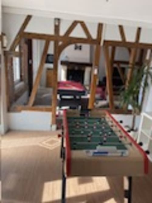 Foosball table in games room at Les Gites De Flaubert, Le Heron, France