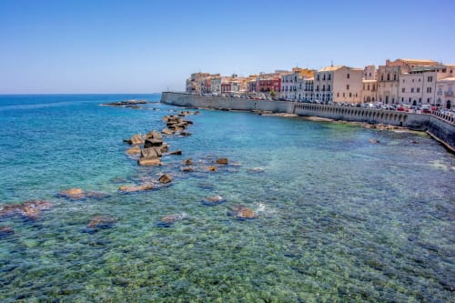 Mare cristallino, Ortigia, Siracusa, barocco ricco di storia, resti greci, cuore di Siracusa