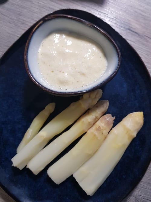Fresh white asparagus spears with creamy sauce at Domaine de l'Oie Rouge, Loire Valley