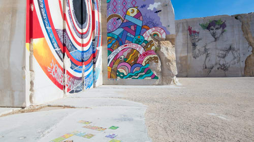 Colorful street art murals at Gites bo, a boutique BnB in Saint-Romain, France with vibrant geometric designs