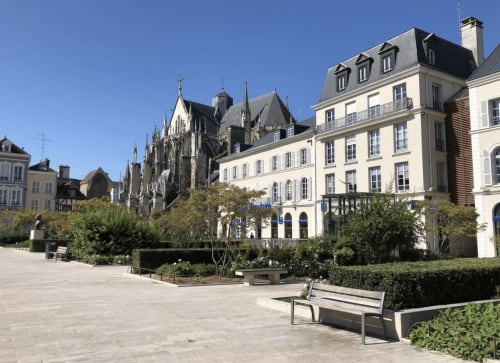 Le Paillot de Montabert hotel in Troyes with Gothic cathedral and Parisian-style buildings overlooking plaza