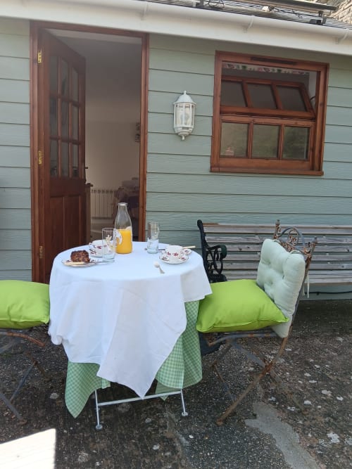 Enjoying afternoon tea outside of Hill View Studio at 2 Ailwood Farm Holidays, Dorset, Jurassic Coast, Walking, Cycling, Climbing