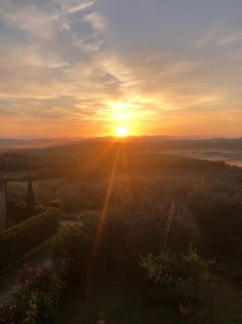 Tramonto sulla campagna toscana dalla Torre della Chiocciola a Monteriggioni, Siena
