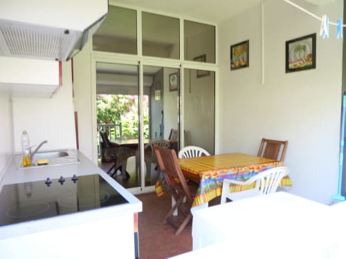 Studio apartment kitchen and dining area at Studio Face Marina in Saint-François with sea view