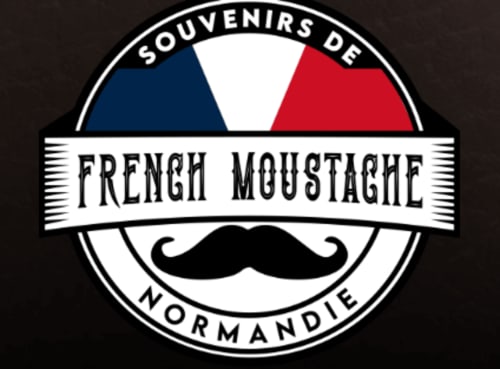 Logo souvenir Moustache Française Normandie avec drapeau tricolore et design moustache pour le gîte Au Gite d'Isigny