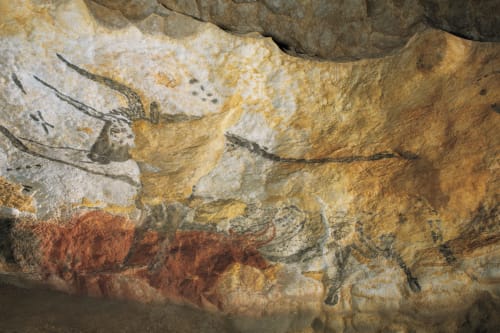 Ancient cave paintings at Domaine De Campagnac, Carsac-Aillac, featuring ochre handprints and animal drawings on stone walls
