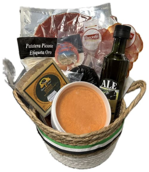 Cesta de regalo gourmet española con jamón curado, paté, cerveza artesanal y salsa de Mérida