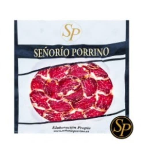 Paquete de productos curados Señorío Porrino con jamón ibérico laminado, delicia gastronómica española cerca de Mérida