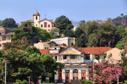 Colorful colonial buildings and church in Rio de Janeiro neighborhood near Rio Vibes Hostel