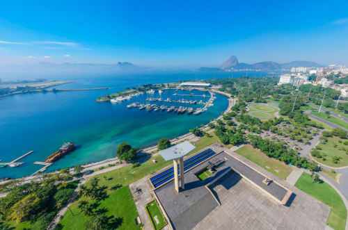 Aerial view of Rio Vibes Hostel with Guanabara Bay, marina, and Sugar Loaf Mountain in Rio de Janeiro