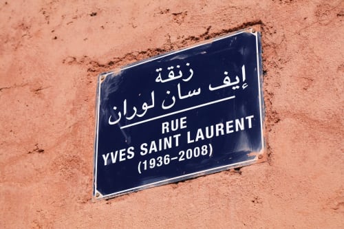 Street sign for Rue Yves Saint Laurent in Marrakech, Morocco near Riad Madinina