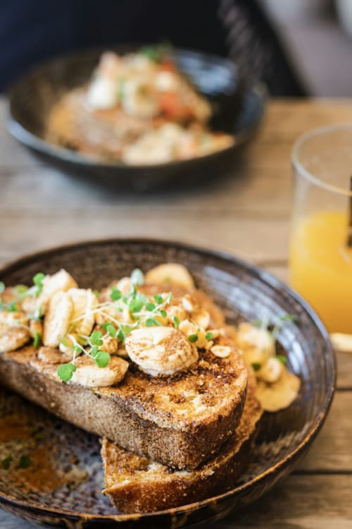 Gourmet toast with spreads and microgreens served at Brooklyn House B&B in Southgate, London