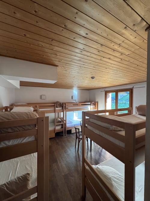 Spacious dormitory in shared room at Ardesia Morzine, ideal for solo travelers or groups