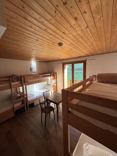 Spacious dormitory in shared room at Ardesia Morzine, ideal for solo travelers or groups