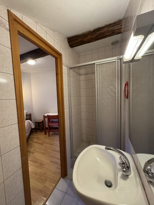 Functional single room at Ardesia Morzine, practical accommodation for solo travelers
