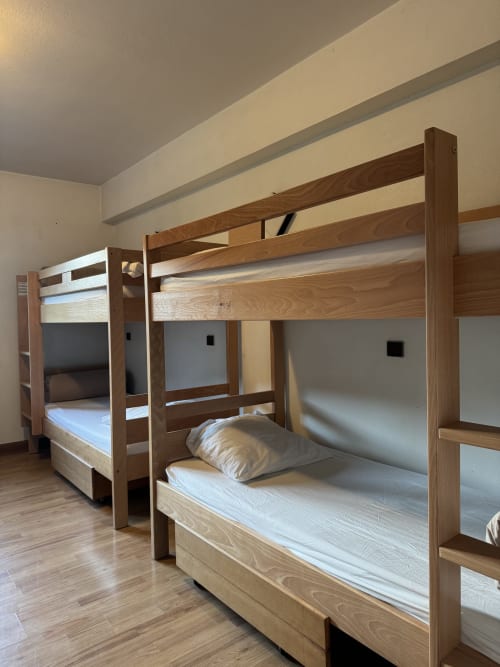 Spacious dormitory in shared room at Ardesia Morzine, ideal for solo travelers or groups