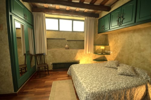 Dormitorio elegante de casa rural con muebles verdes, suelos de madera, vistas al jardín y decoración de época en Can Gat Vell