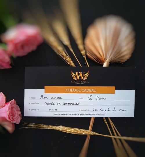 Les Secrets de Winna gift voucher with romantic design, pink roses and golden wheat details for Deux-Sèvres getaway