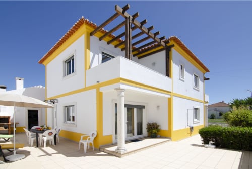 Modern yellow and white villa at Home Alliance in Bombarral, Óbidos with terrace and pergola