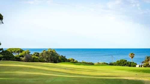 Casas de Juromenha coastal golf course with ocean views and Mediterranean vegetation, Portugal