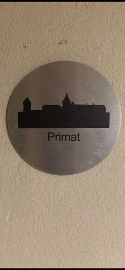 Primat room plaque at Le Petit Château, a bed and breakfast in Baye, France featuring garden views and modern amenities