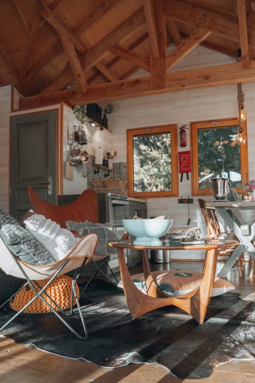 Modern lounge with natural wood finishes | Luxury Treehouse Stay in Central France