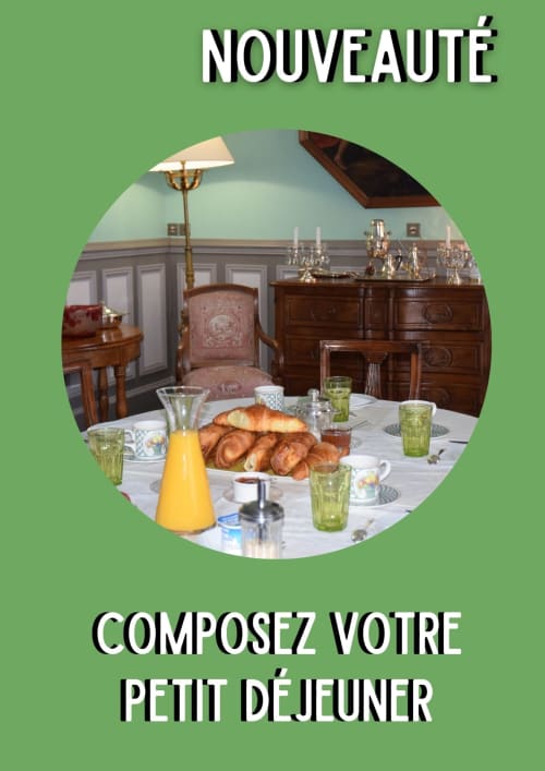 Elegant breakfast room at Le Fassardy B&B in Châteauroux with croissants, juice, and classic French décor