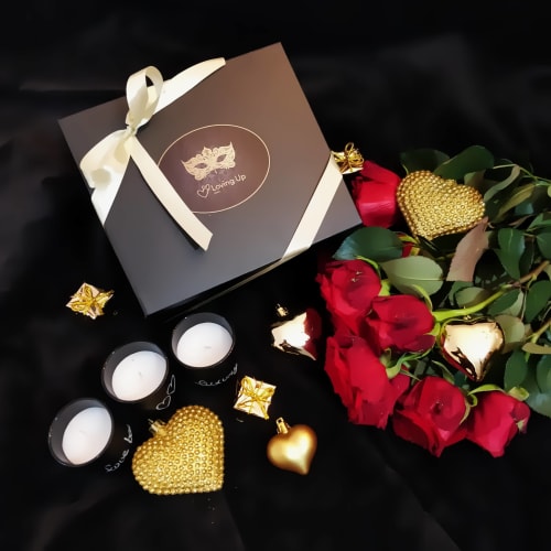 Coffret cadeau de luxe avec roses rouges, cœurs dorés, bougies et boîte « Loving Up » au Domaine du Haut de la Dombes