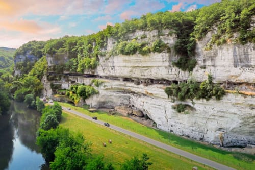 Scenic limestone cliffs above river near Domaine De Campagnac, Carsac-Aillac, France