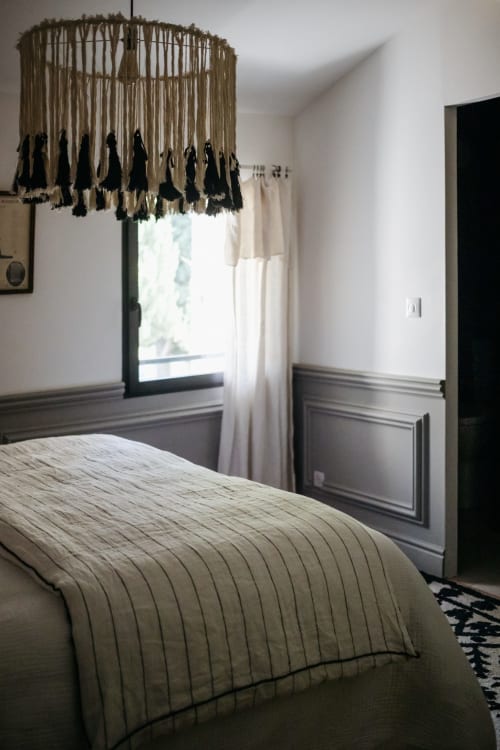 Histoire room at Mas des Ecoliers with garden view. A romantic retreat to relax and enjoy the serene charm of Provence.