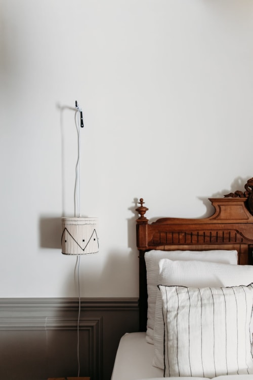 Histoire room at Mas des Ecoliers, cozy and romantic décor, relaxing couple’s stay with garden and pool.