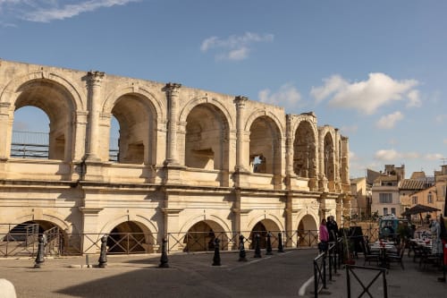 Ancient Roman amphitheater facade with arched openings in Montfrin, France near Le Prieuré Notre-Dame