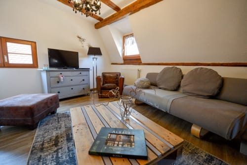 Salon raffiné du gîte Les Géraniums à Riquewihr