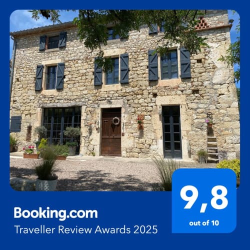 Maison Mûrier stone farmhouse in Fayssac with blue shutters, terracotta roof, Booking.com award 9.8/10