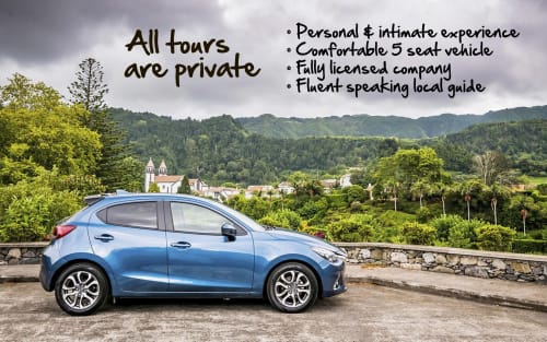Blue car parked at Villa Várzea in Várzea, Portugal with private tour service information and scenic valley landscape