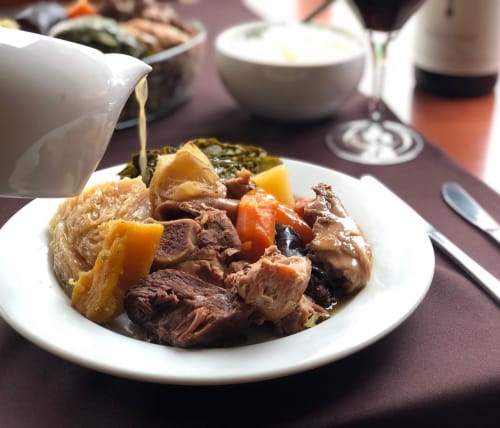 Braised beef stew with potatoes and vegetables served at Villa Várzea guesthouse in Várzea, Portugal