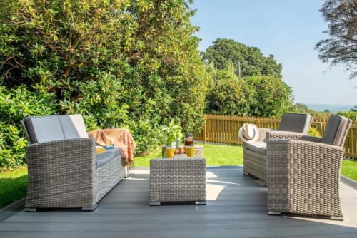 Tables and chairs | Hat | Trees | Balcony  |Sky