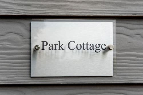 Experience luxury in this holiday home near Tavistock with 1 living room, 1 bedroom, and a walk-in shower. Fully equipped kitchen, terrace with garden views, flat-screen TV, and more amenities. Max occupancy: 4.