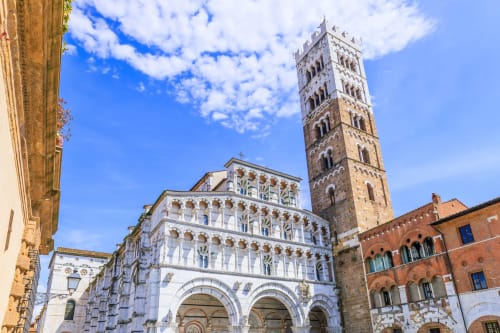 Historic cathedral in Lucca with ornate facade and tall bell tower, near Il Casale di Nanni guesthouse