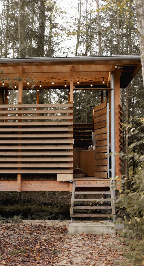 Wooden façade and stairs, Lodge Agnès entrance