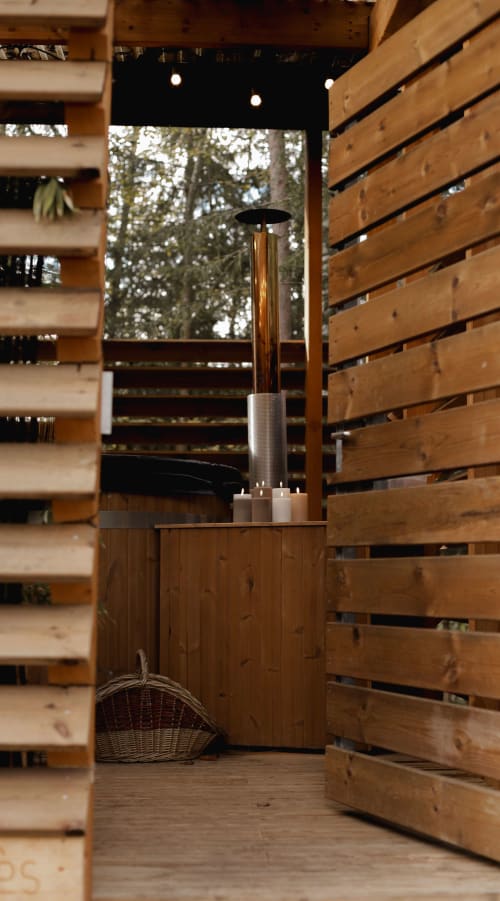 Wooden slats and plants, nature deck of the lodge