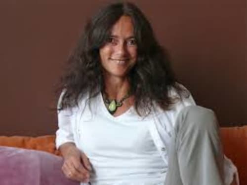 Woman smiling at Espace Ker Gana, a bed and breakfast in Plourin, France