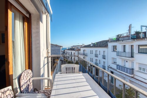 Sunny balcony with sea view at Can Niell apartment in Calella de Palafrugell, Spain