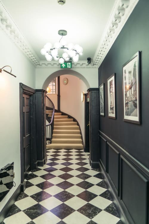 Bridge Street Apartments | Stairs | Hall way | Chandelier | Photos