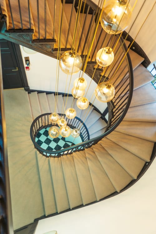 Bridge Street Apartments | Chandelier | Stairs | Door