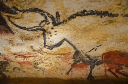 Ancient cave paintings at Domaine de la Grande Décision, La Douze featuring prehistoric deer and hunting scenes