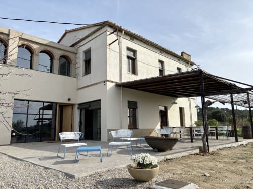 Finques Garcia Enrich hotel terrace in Palafrugell with modern seating and pergola