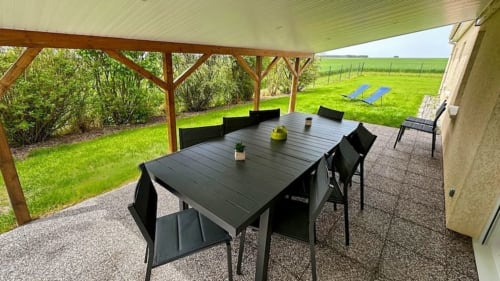 Private garden retreat, vacation rental with outdoor space, holiday home with a terrace, lush green garden stay, nature escape accommodation.