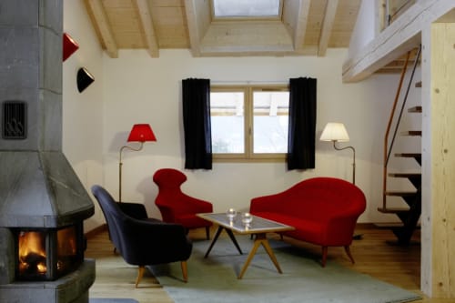 Living area with fireplace | Penthouse Apartment – ​​Luxury and Exceptional Panorama